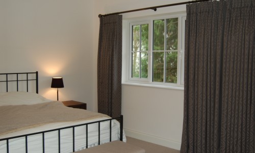 Photo showing floor length curtains made by Diana Murray Interiors